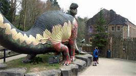 Dillan and George with the Brachiosaurus in Dinosaur Grove, Wookey Hole