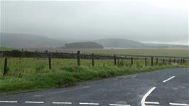 Malham Tarn, just visible through the cloud and rain