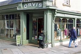 A bear lends a hand at a shop near Pulteney Bridge, Bath