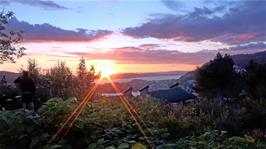 Sunset from Bergen Montana Youth Hostel as we start our pizza meal in the gardens