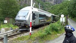 John's train passes us at a level crossing