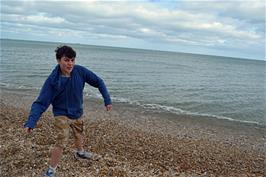 Lawrence skims stones at Torcross