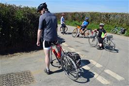 Thirty four manhole covers at Bramble Oak Cross, Denbury