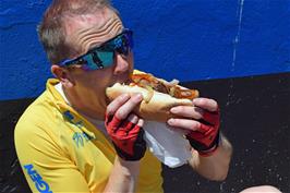 Julian enjoys his Bratwurst at Totnes food market