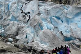 Earlier groups on the first stage of the glacier climb