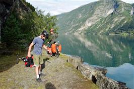 George and Will on the shores of Lustrafjorden, on the abandoned cycle route near the Otta tunnel