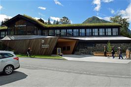 The Norsk Fjellsenter, a visitor centre for the national parks, located between the church and the bakery