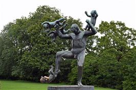 "Man chasing four geniuses" on the Bridge section of Frogner Park