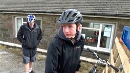 George, eating his secret supply of crisps at Flash Village Hall, with Dillan behind 