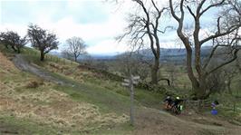 The stony track from the road deposits us on a rough hillside