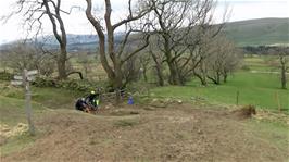 The stony track from the road deposits us on a rough hillside