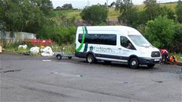 Our bus, complete with cycle trailer, at Lairg train station