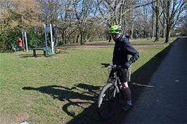 Dillan investigates the exercise machines in Mill Marsh Park, Bovey Tracey