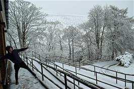 George tries Shotput with snowballs outside Edale youth hostel