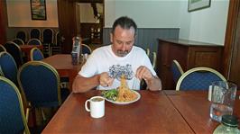 Tao tucks into his dinner at Langdale youth hostel