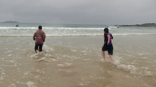 Taking the plunge at Harlyn Bay.