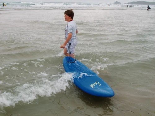 Ashley with his rented surf board at Perranporth
